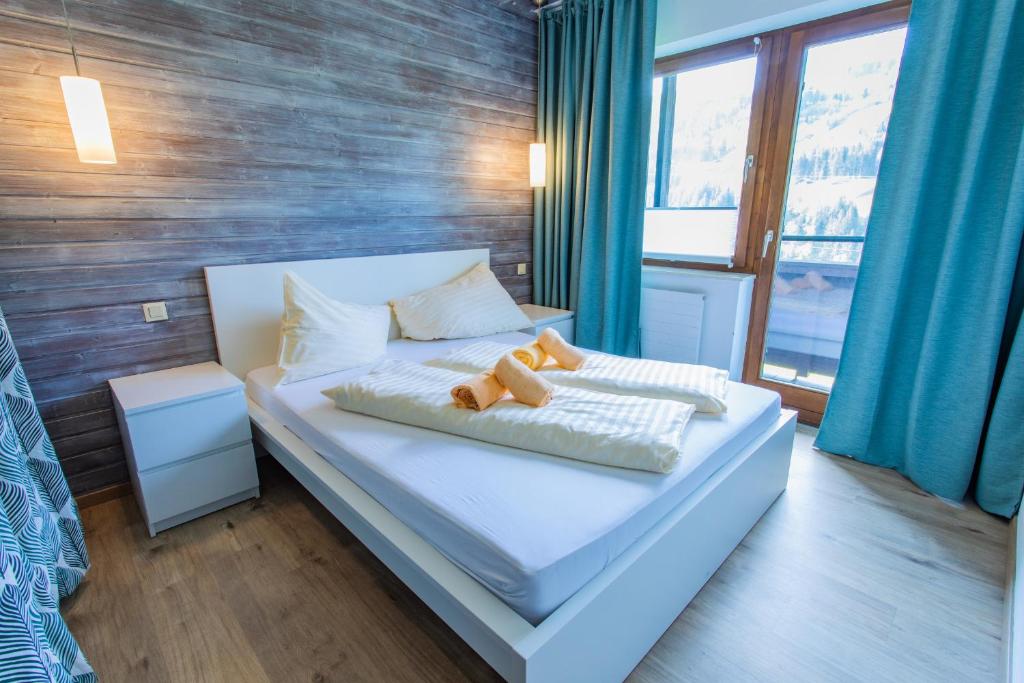 Posteľ alebo postele v izbe v ubytovaní Huberhof 10 by Alpenidyll Apartments