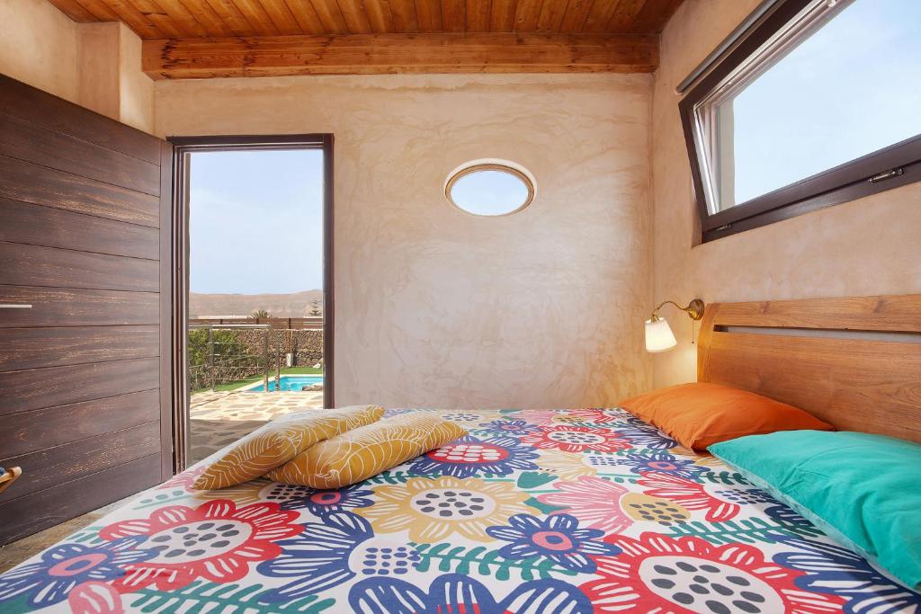 Postel nebo postele na pokoji v ubytování Tayu Eco Villa