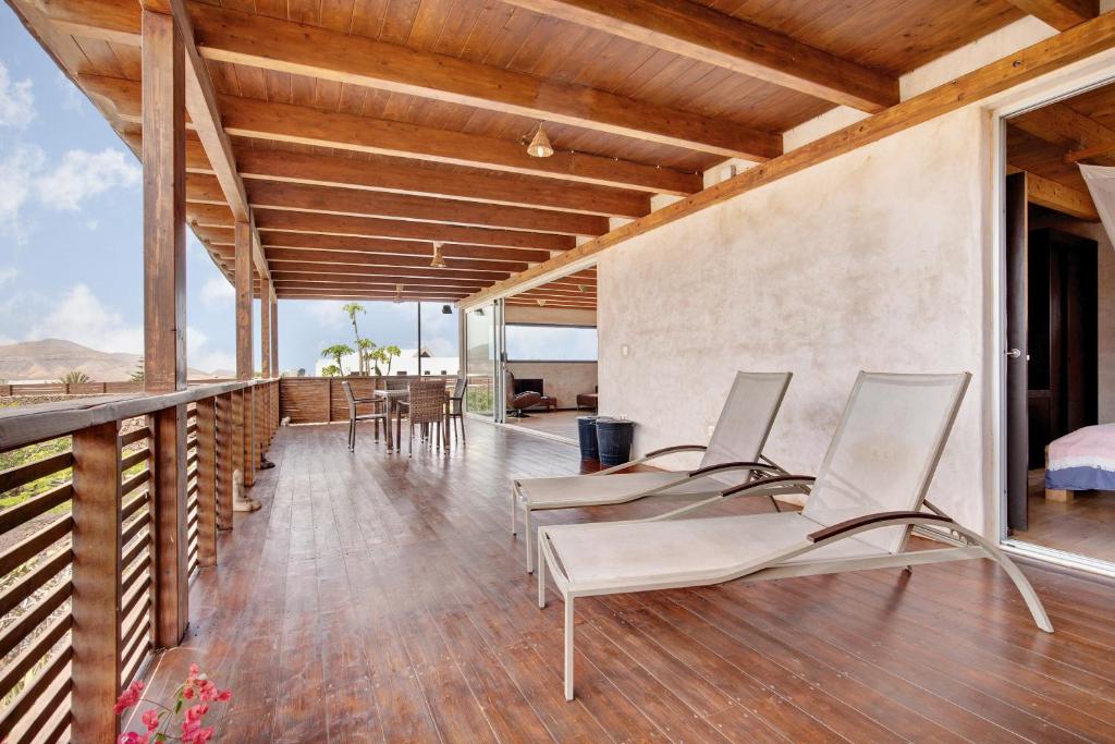 Balkón nebo terasa v ubytování Tayu Eco Villa
