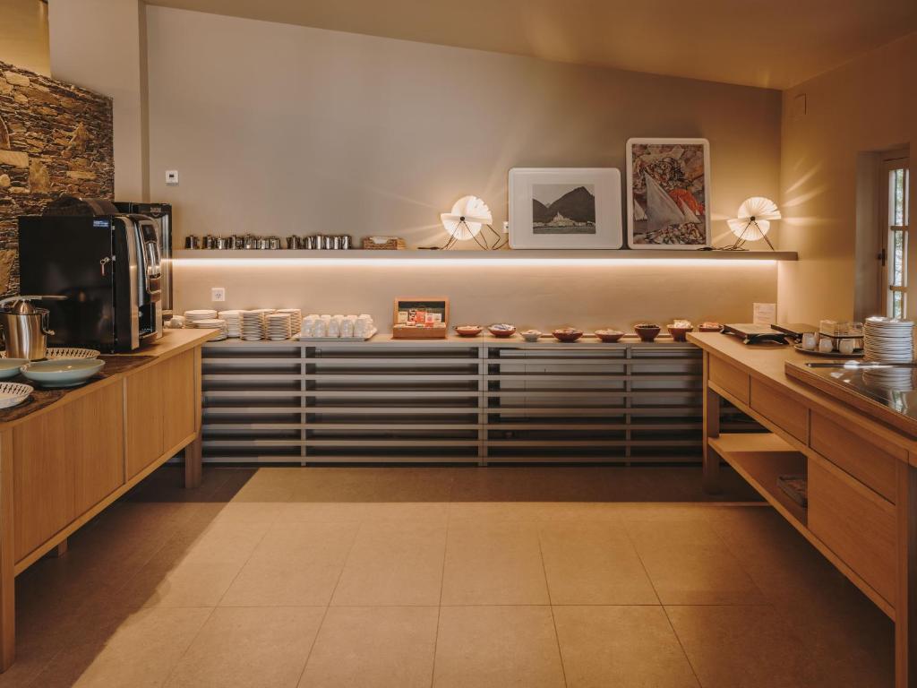 Kuchyň nebo kuchyňský kout v ubytování Hotel Llane Petit