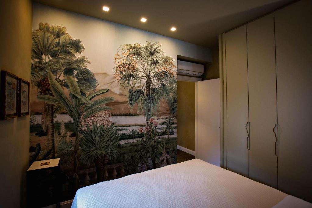 A bed or beds in a room at Casa Segreta