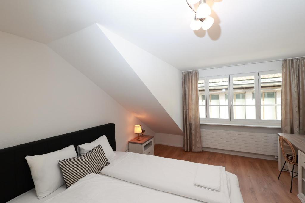 Postel nebo postele na pokoji v ubytování KoBi Apartments Falkenplatz