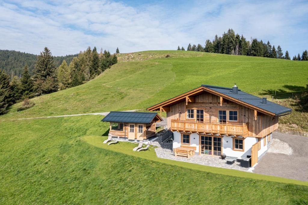 an overhead view of a wooden house on a hill at Almliesl STJO-658 in Sankt Johann im Pongau