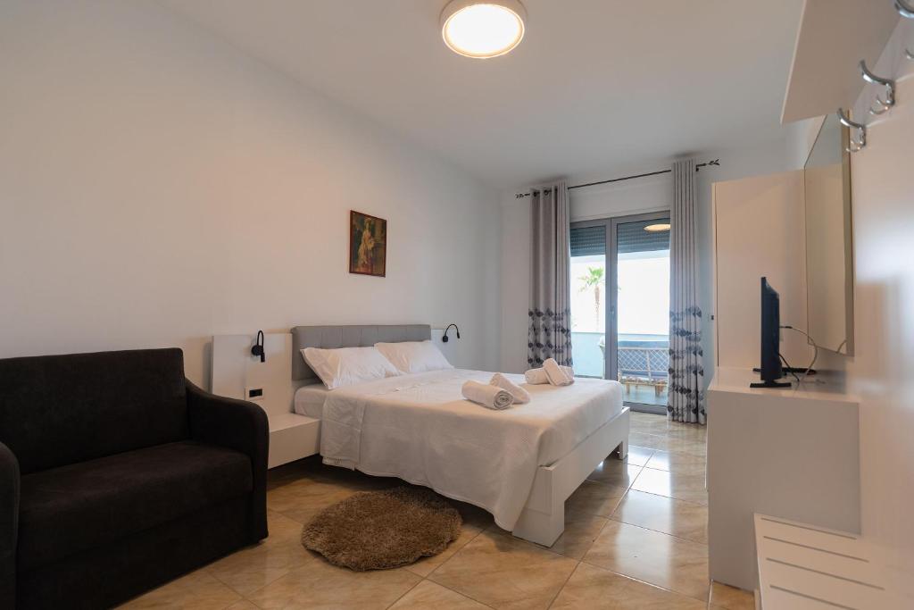 Postel nebo postele na pokoji v ubytování Hotel Pirro