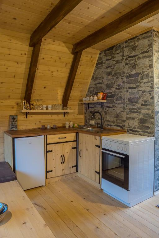 Kuchyň nebo kuchyňský kout v ubytování Mountain Houses Emilija