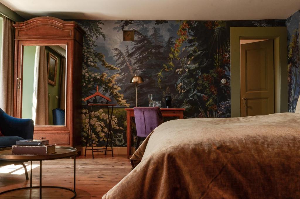 Postel nebo postele na pokoji v ubytování Hôtel Bella Tola & SPA