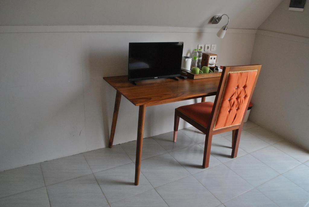 TV a/nebo společenská místnost v ubytování Seaside Villa & Muse Beach Resto
