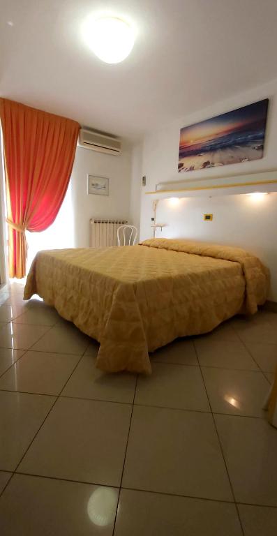 Postel nebo postele na pokoji v ubytování Hotel Medusa