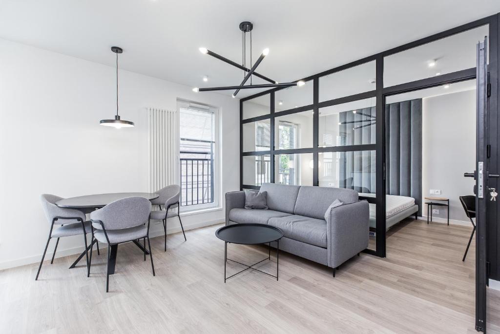 Posedenie v ubytovaní Apartments Browar Kleparz by Noclegi Renters