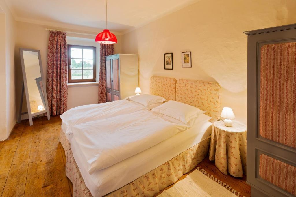 Postel nebo postele na pokoji v ubytování Das Gärtnerhaus