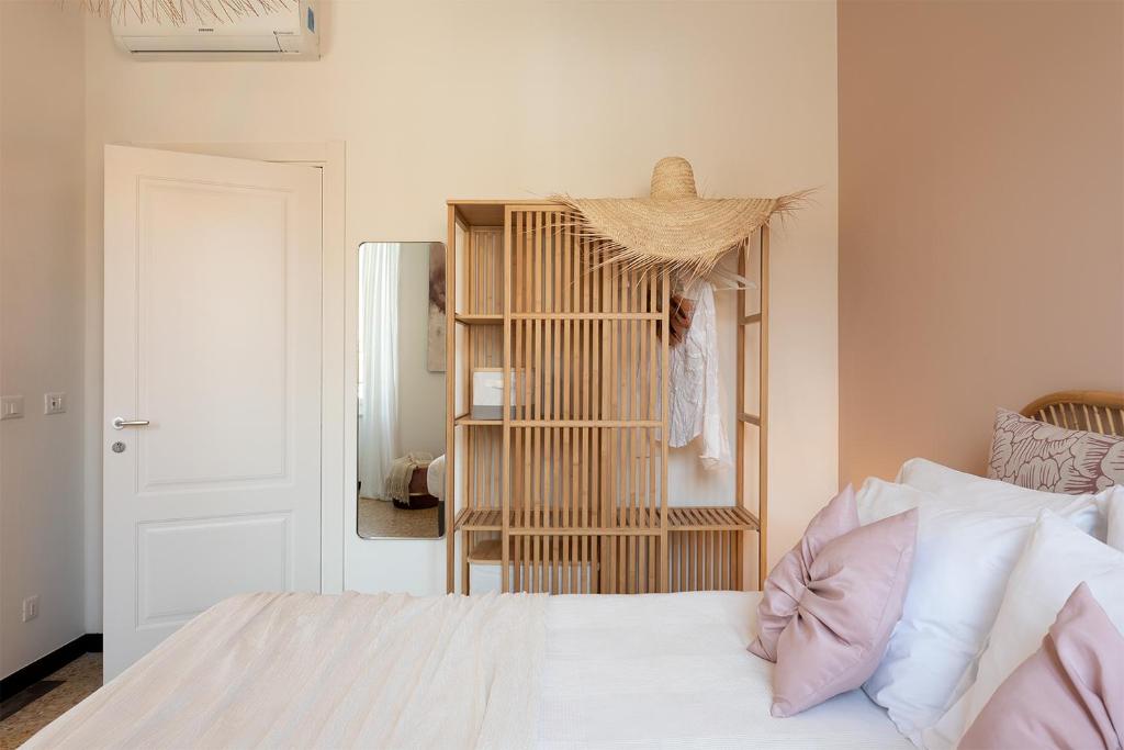 Posteľ alebo postele v izbe v ubytovaní Ensemble rooms di Vayadù