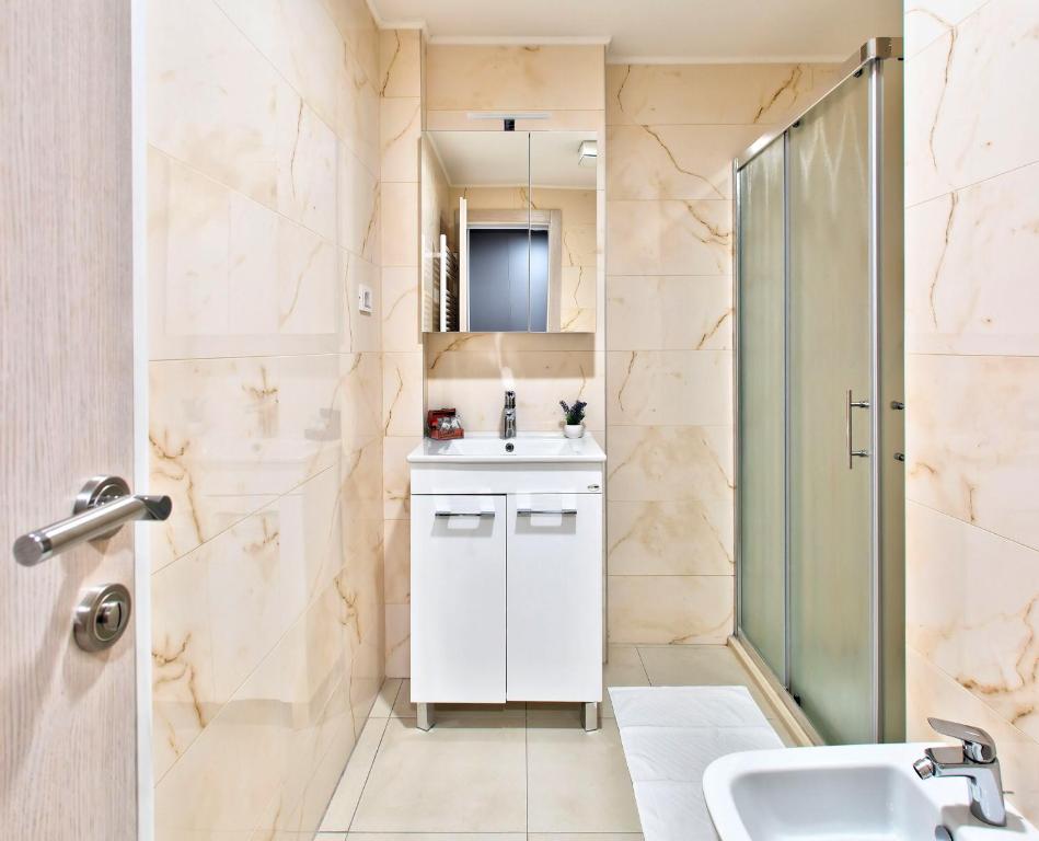 Koupelna v ubytování Hotel Dompes