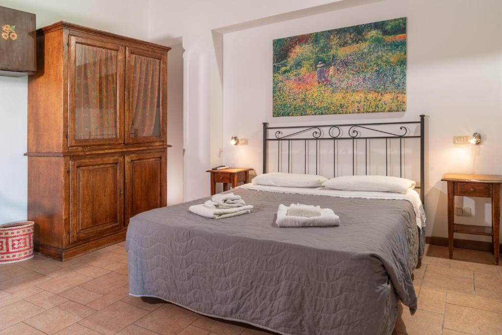A bed or beds in a room at Agriturismo Al Girasole