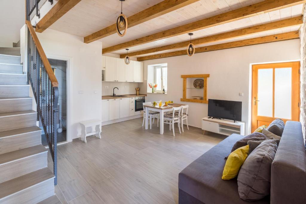 TV a/nebo společenská místnost v ubytování Olive Garden Apartment
