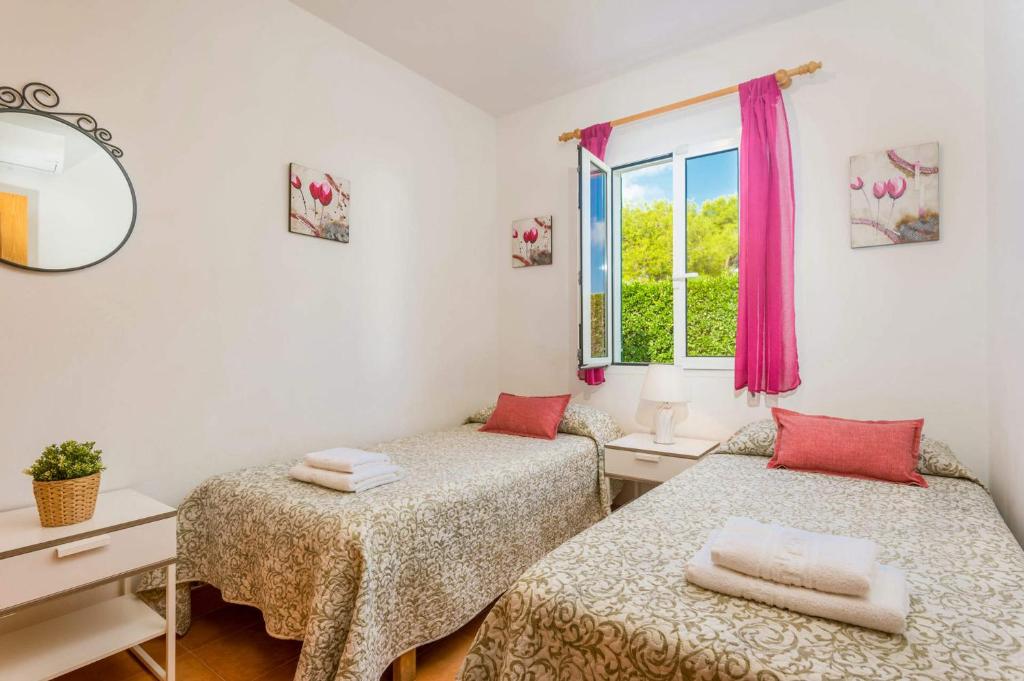 Postel nebo postele na pokoji v ubytování Villa Dolfi by Villa Plus