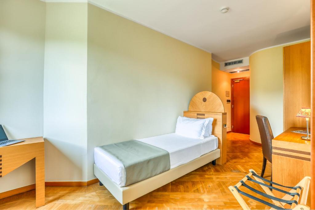 Postel nebo postele na pokoji v ubytování Hotel PentHouse