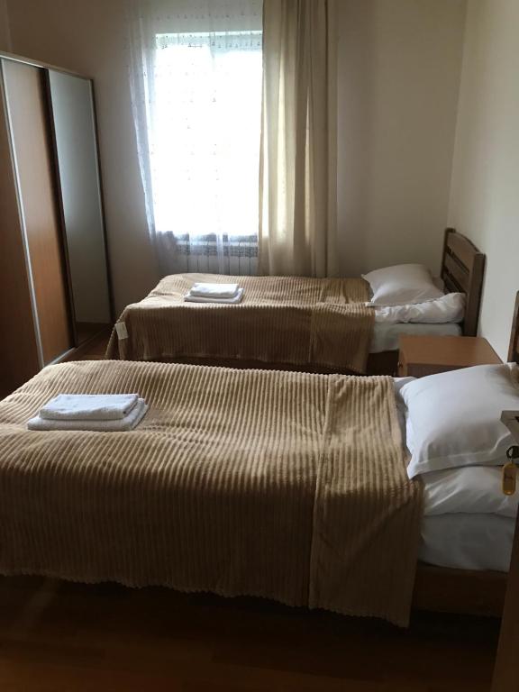 Postel nebo postele na pokoji v ubytování Guest House Gogia