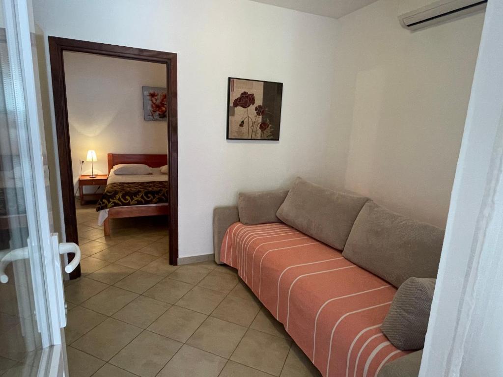 Postel nebo postele na pokoji v ubytování Apartments Iva