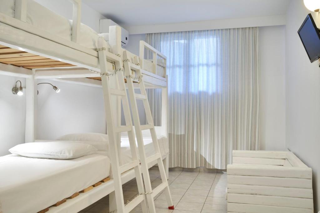 Postel nebo postele na pokoji v ubytování Polos Hotel Paros
