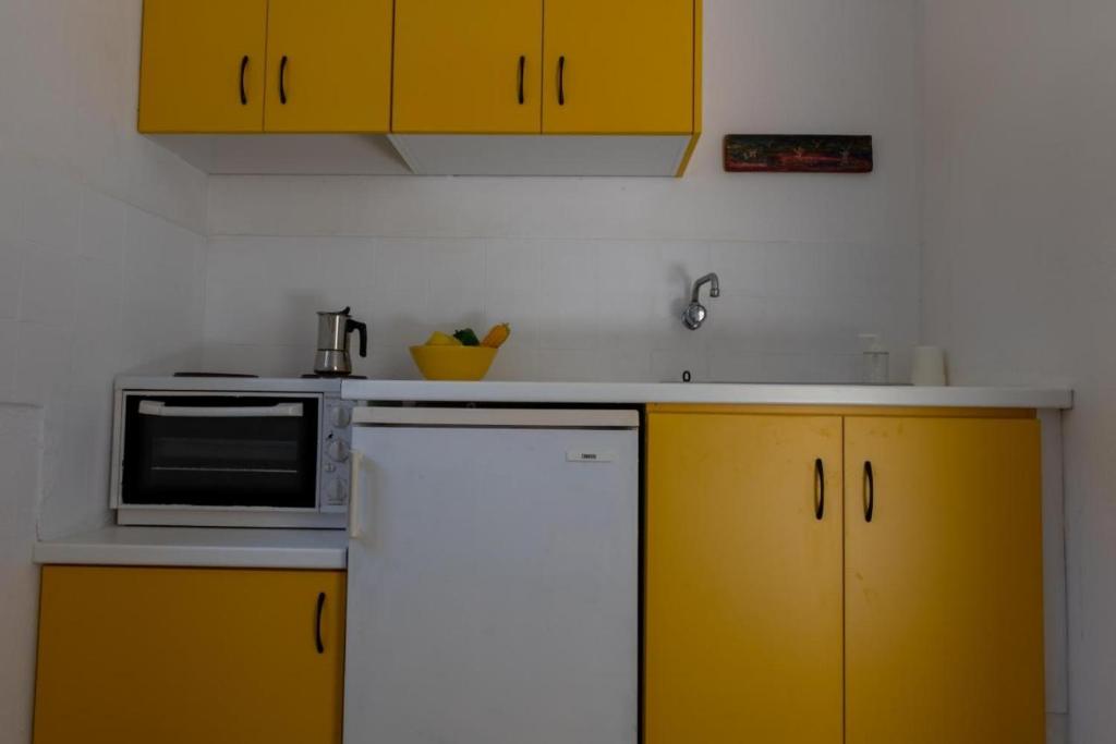 Kuchyň nebo kuchyňský kout v ubytování Olive terra holiday aparments