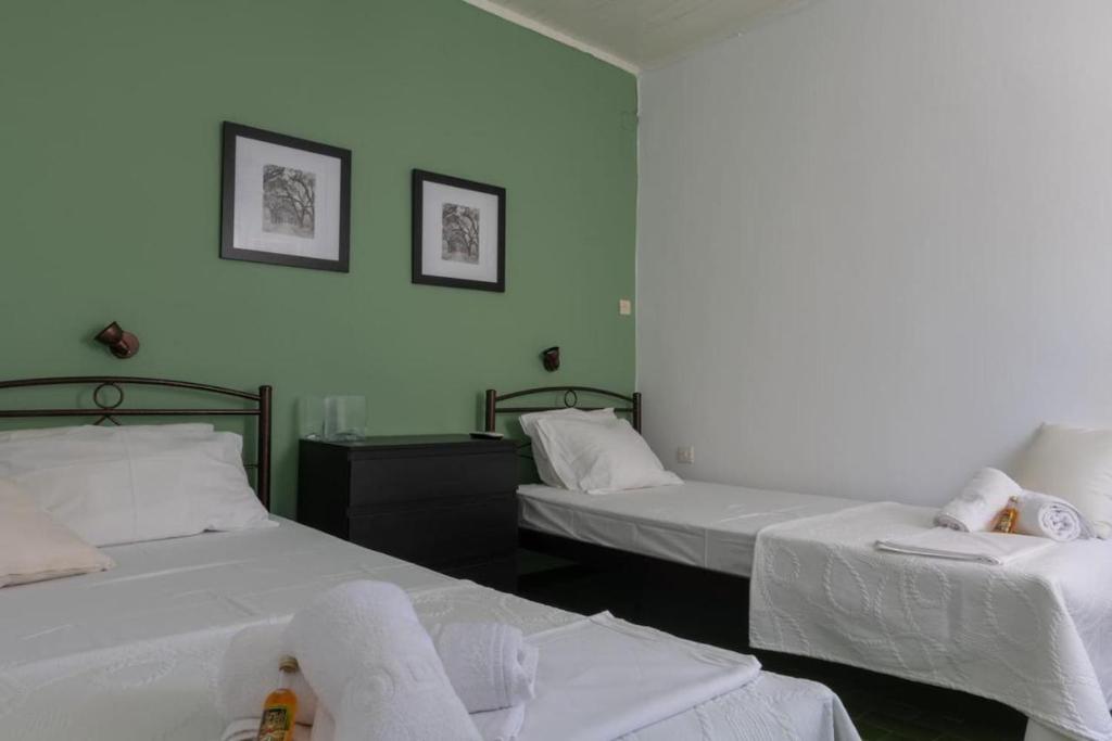 Postel nebo postele na pokoji v ubytování Olive terra holiday aparments