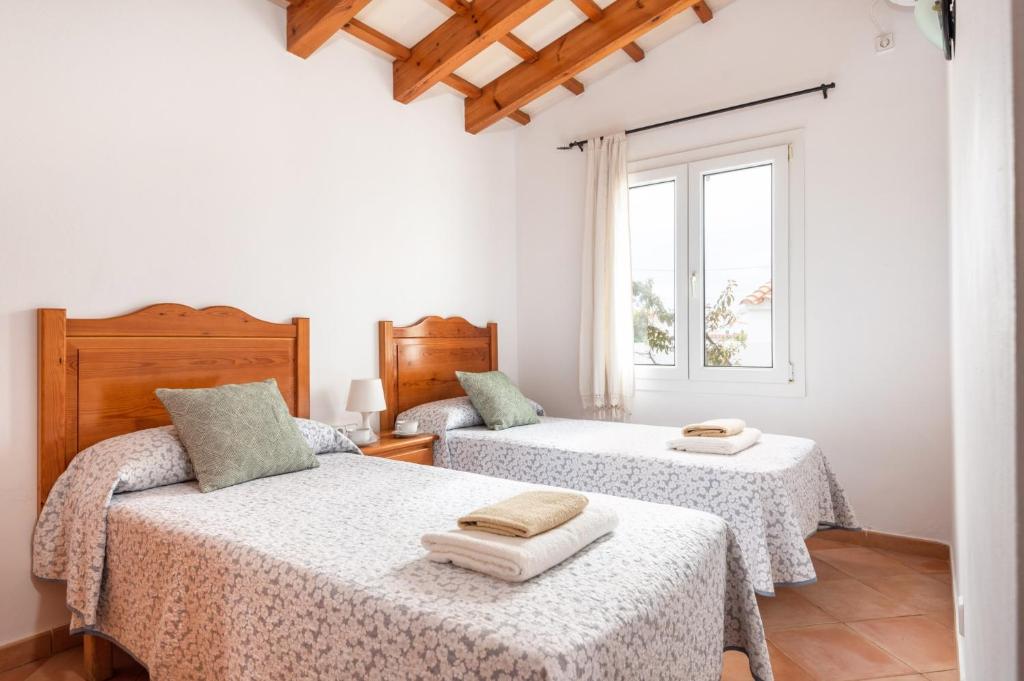 Postel nebo postele na pokoji v ubytování Villa Ingrid Porter by Villa Plus