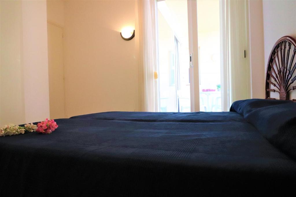 A bed or beds in a room at Mediterraneo 2 3 6 Roses - Immo Barneda