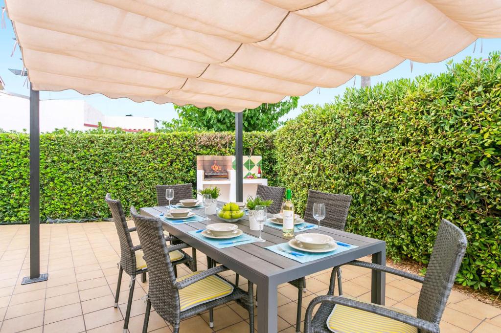 A garden outside Villa Beltran by Villa Plus