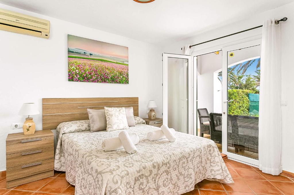 A bed or beds in a room at Villa Beltran by Villa Plus