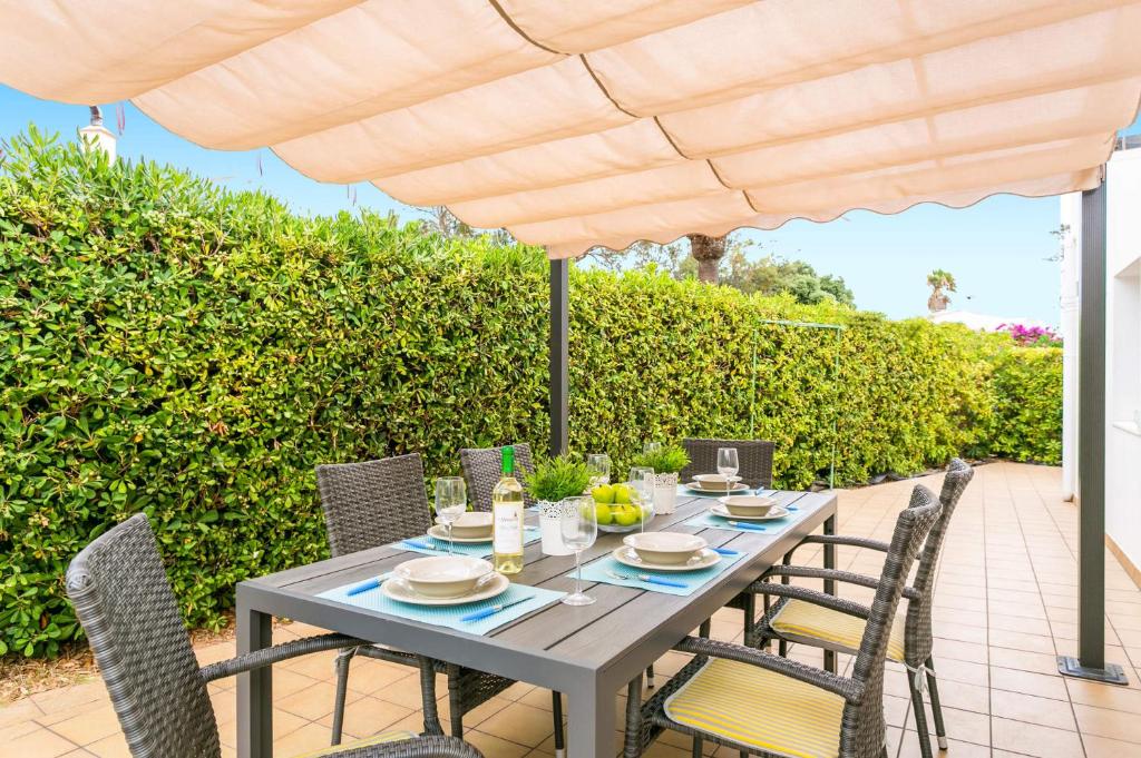 A garden outside Villa Beltran by Villa Plus
