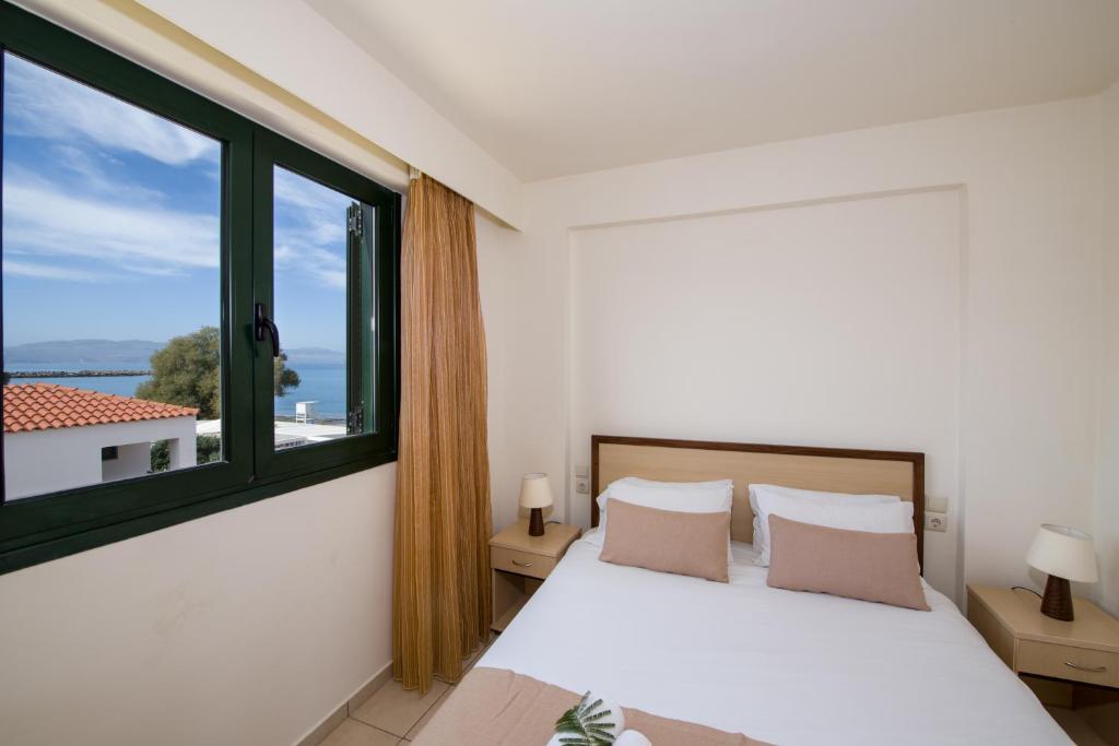Postel nebo postele na pokoji v ubytování Margarita Beach Hotel