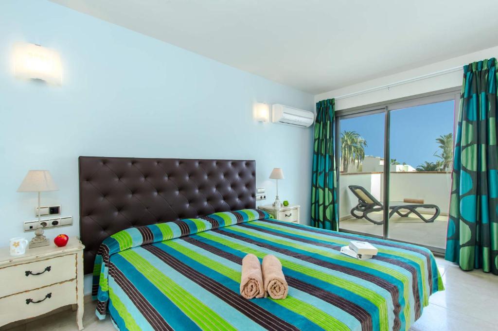 Postel nebo postele na pokoji v ubytování Villa Nanda by Villa Plus