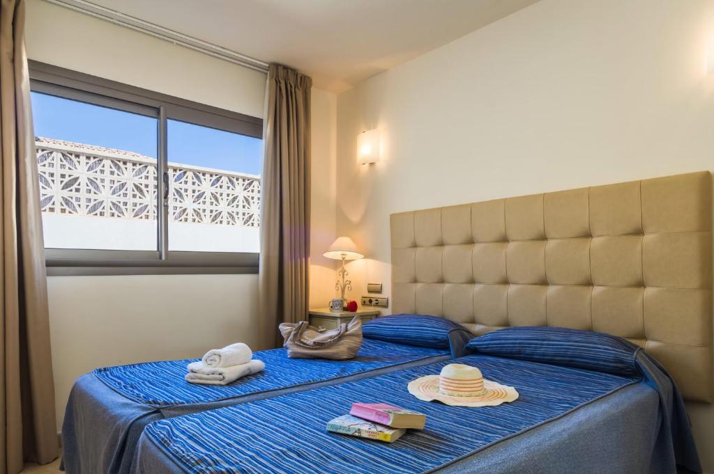 A bed or beds in a room at Villa Sirena by Villa Plus