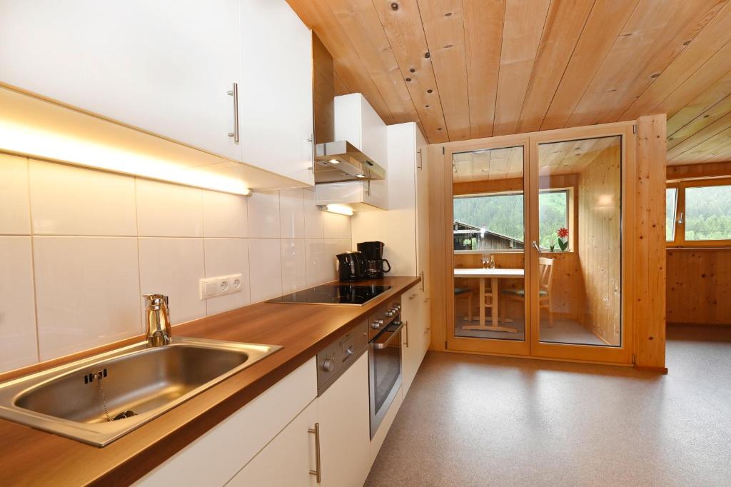 Kuchyň nebo kuchyňský kout v ubytování Appartements Willi