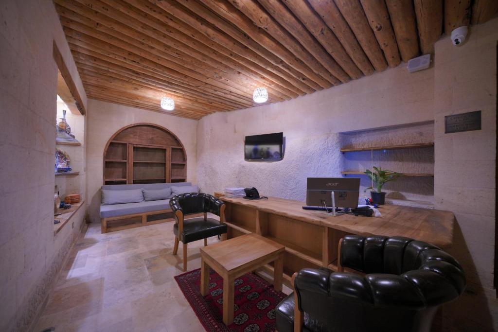 TV a/nebo společenská místnost v ubytování Kappadoks Cave Hotel