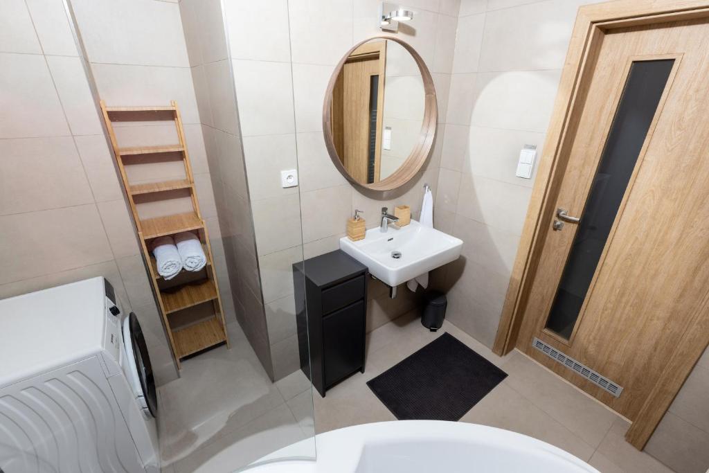 Postel nebo postele na pokoji v ubytování Apartmán 21 Hubertus