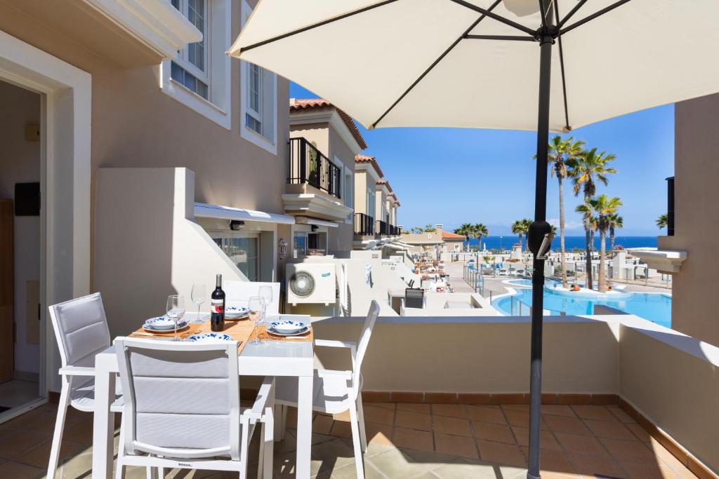 Bazén v ubytování Apartment El Faro nebo v jeho okolí
