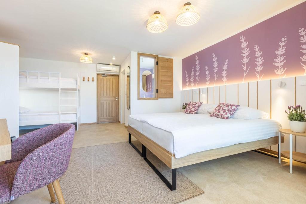 Postel nebo postele na pokoji v ubytování Hotel Vile Park Premium