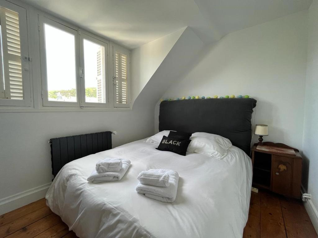 Posteľ alebo postele v izbe v ubytovaní Maison familiale de ville à Etretat