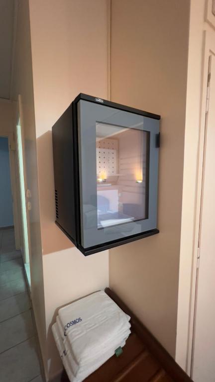 Postel nebo postele na pokoji v ubytování Hotel Cosmos