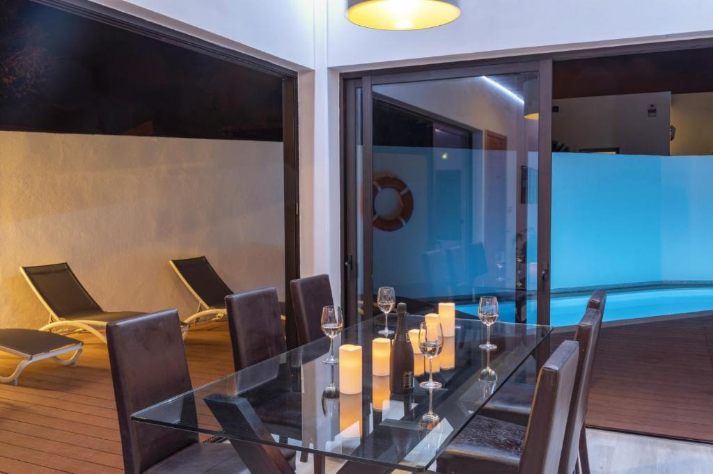 A seating area at Villa JJ Beach by Villa Plus