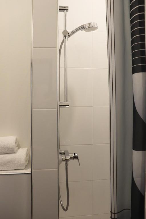Koupelna v ubytování Hotel National Antwerp