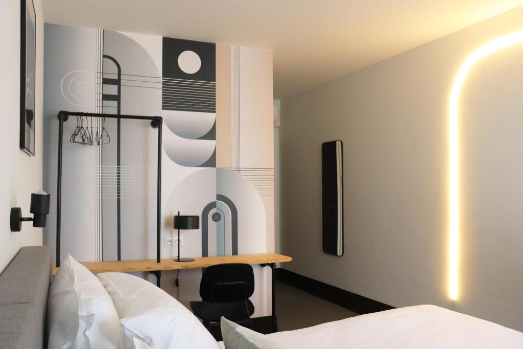 Postel nebo postele na pokoji v ubytování Hotel National Antwerp