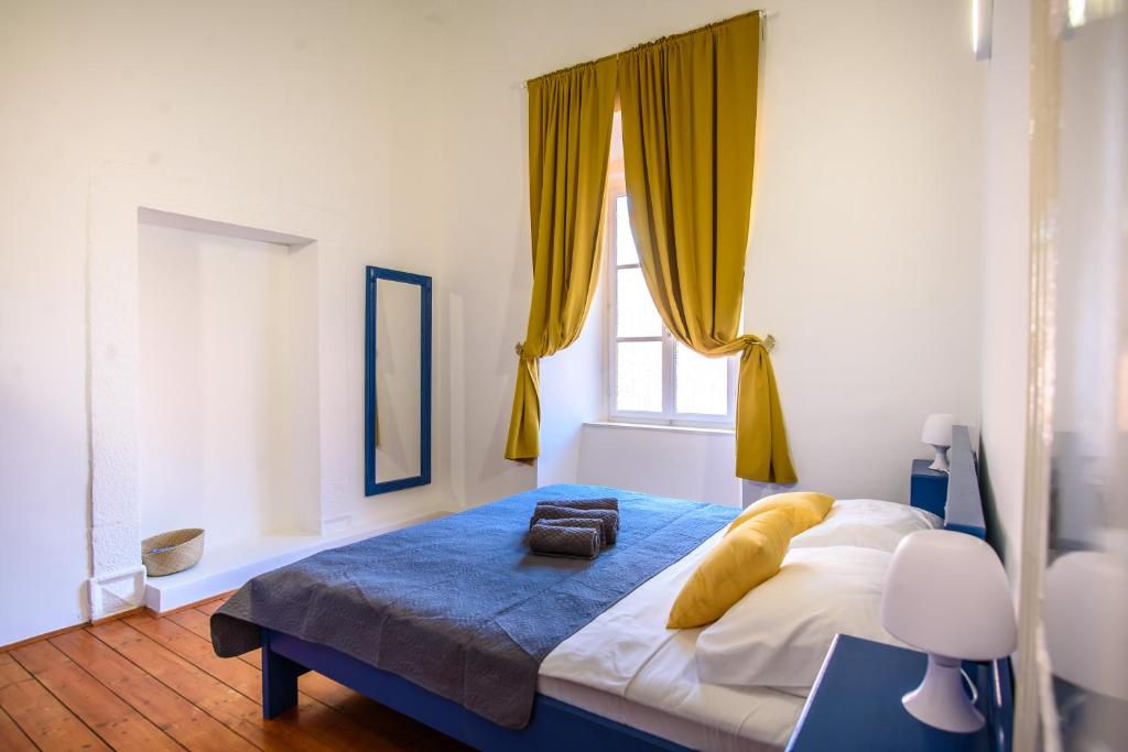 Posteľ alebo postele v izbe v ubytovaní LE MURA OLD TOWN APARTMENT by DuHomes