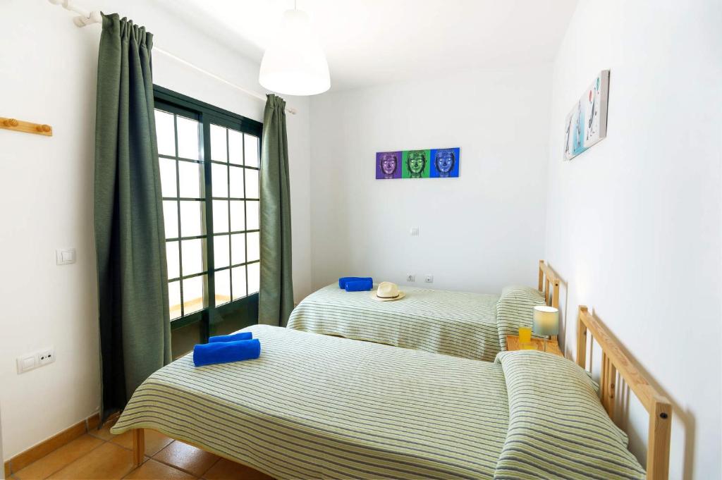 Postel nebo postele na pokoji v ubytování Villa Jessica by Villa Plus