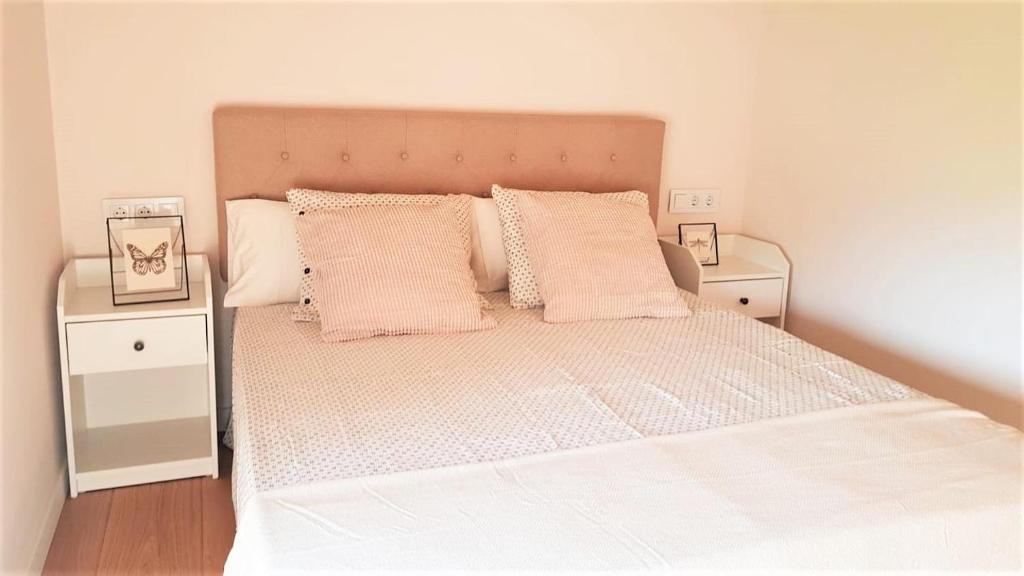 Postel nebo postele na pokoji v ubytování Casa adosada moderna en Guils