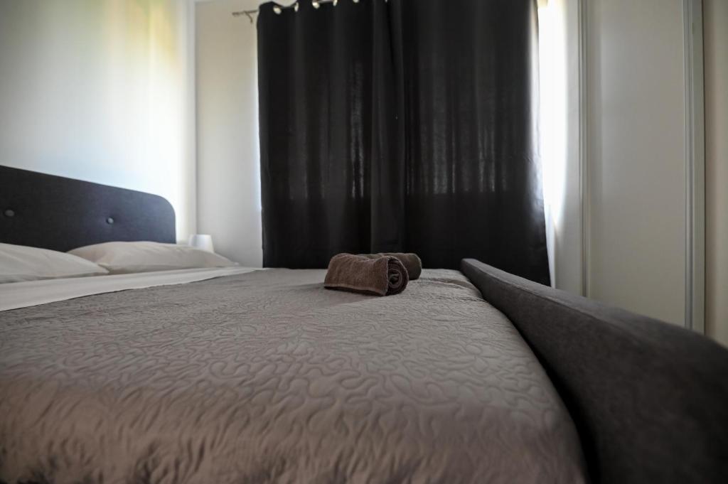 Postel nebo postele na pokoji v ubytování Apartmani Frleta