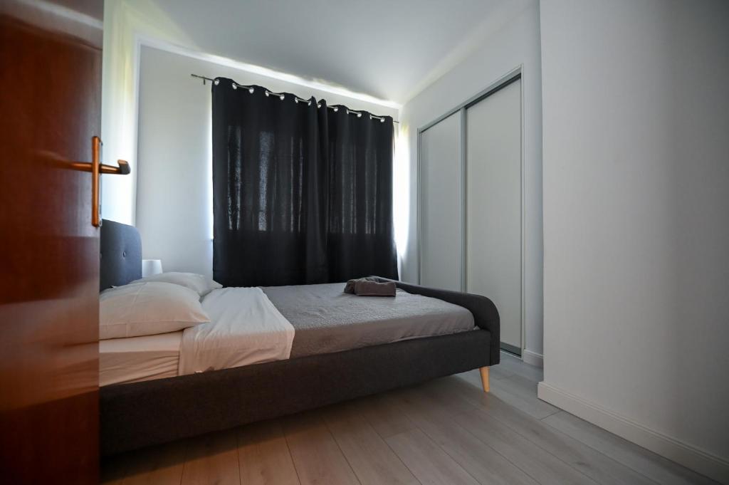 Postel nebo postele na pokoji v ubytování Apartmani Frleta