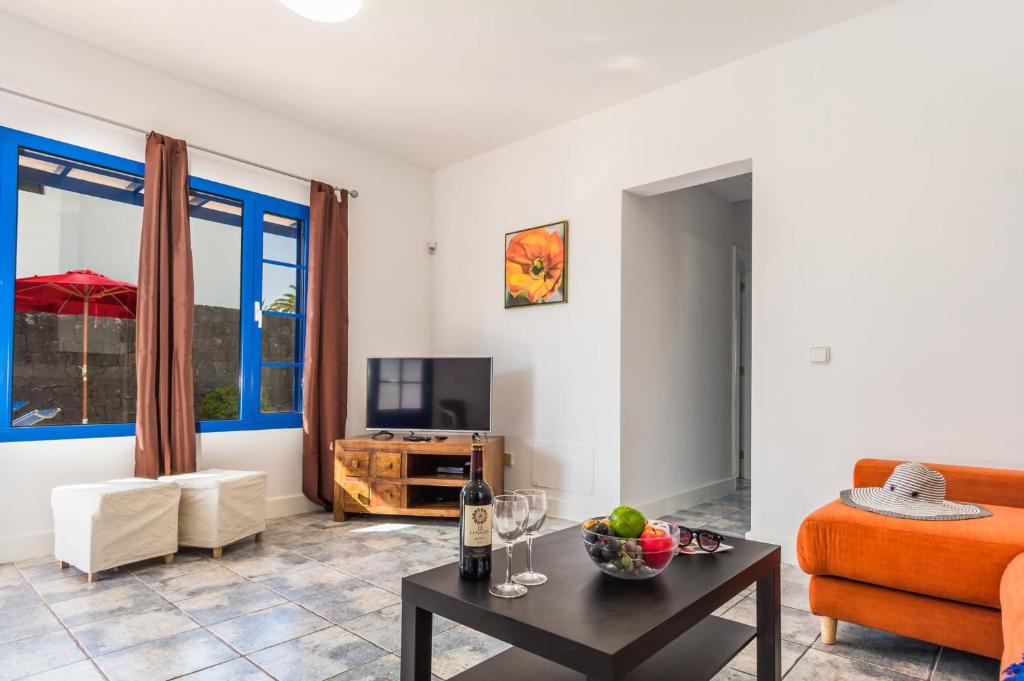 Televízia a/alebo spoločenská miestnosť v ubytovaní Villa Natacha by Villa Plus