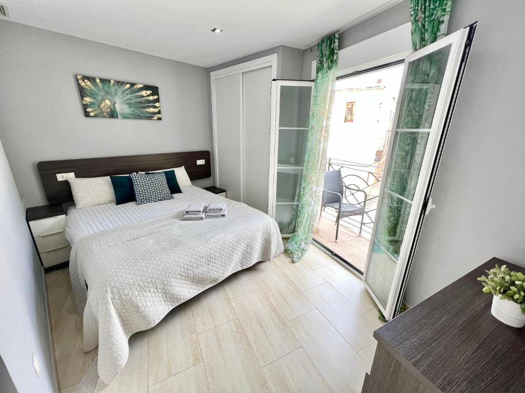 Postel nebo postele na pokoji v ubytování El Pont Alicante Apartments